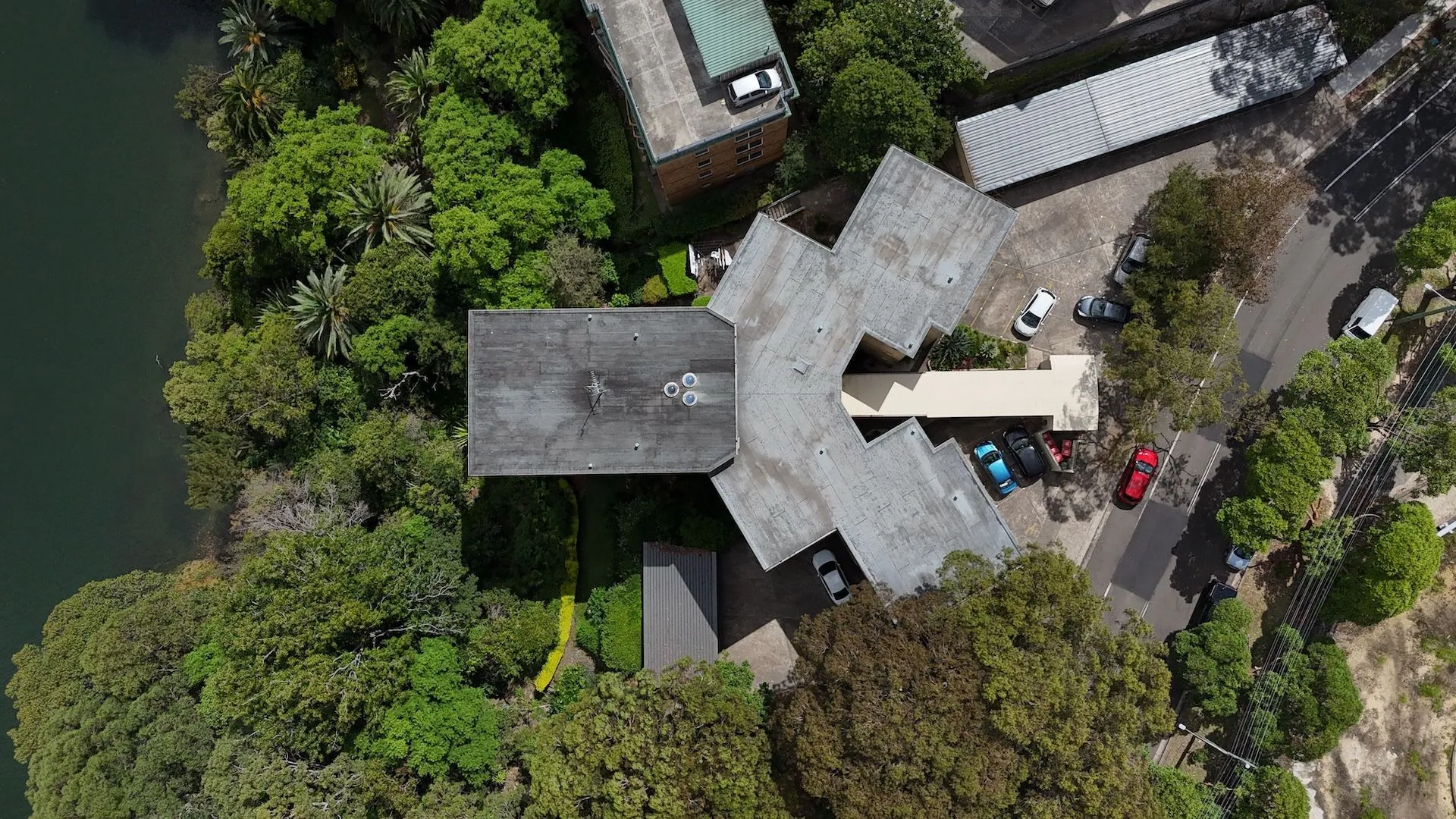 Aerial view of a strata apartment building roof during remedial works, Sydney